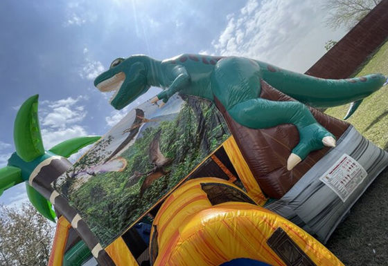 Experience the Thrills of the Dinosaur Era with Our Inflatable Bounce House and Slide