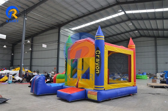 Blower-Equipped Inflatable Crayon Bounce House with Side Slide and Customizable Design